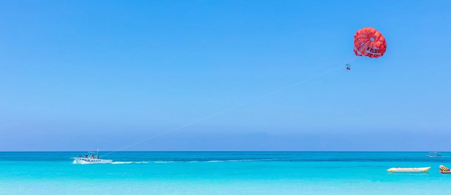 Parasailing over the crystal clear waters of Negril, Jamaica